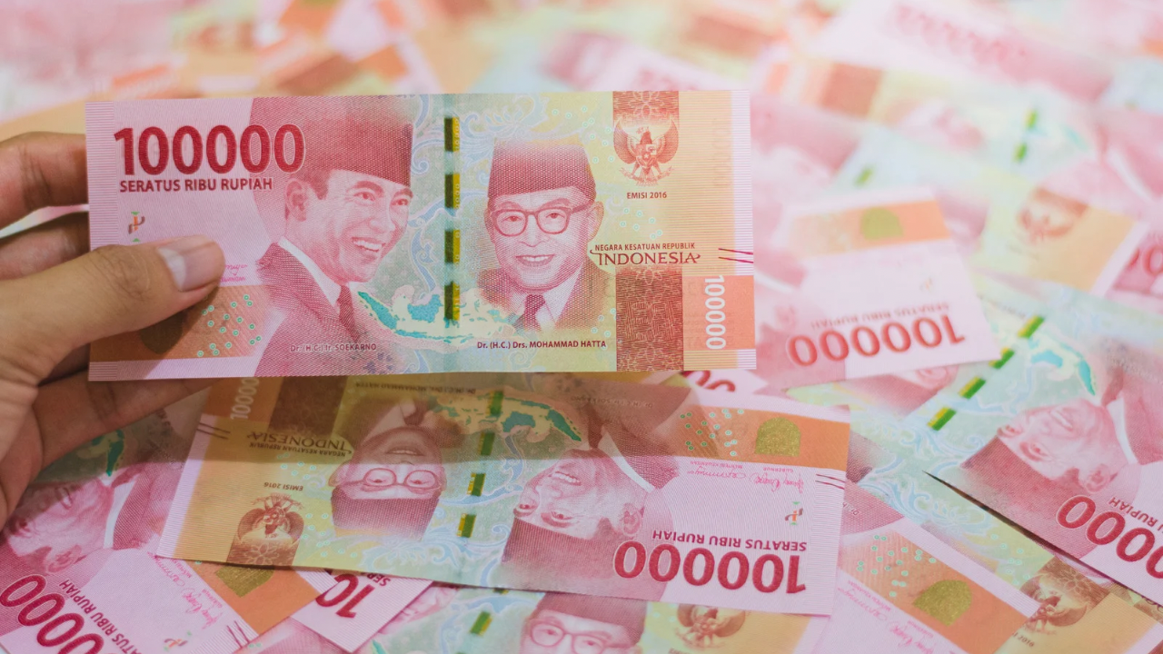 Ilustrasi uang (Canva)